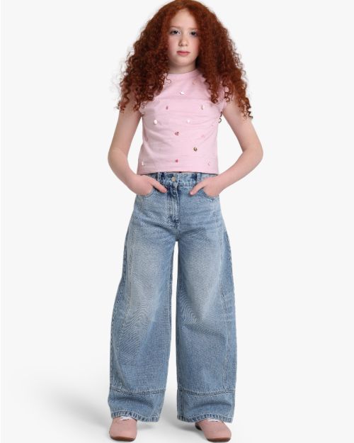 Girls pink cropped jersey top with colourful scattered gem embellishments and tie shoulders 4 yrs Front | Locafy