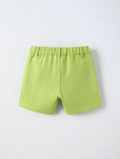 Baby girl lime green cotton shorts with scallop-trim patch pockets and elastic waistband 3-6 mth Front | Locafy
