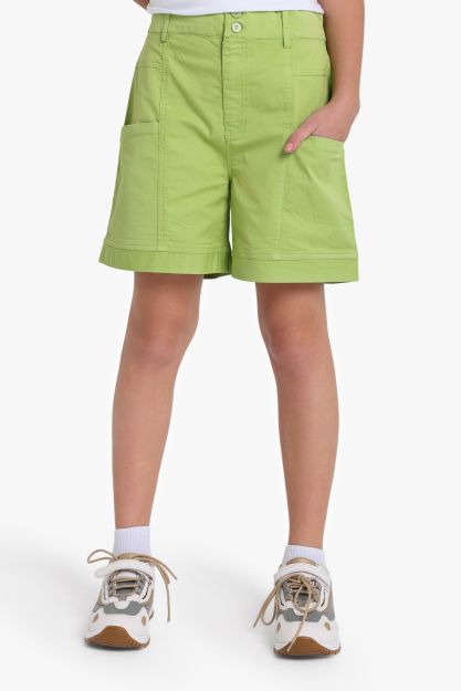 Girls lime green cotton chino shorts with large patch pockets and cuffed hem 4 yrs Front | Locafy