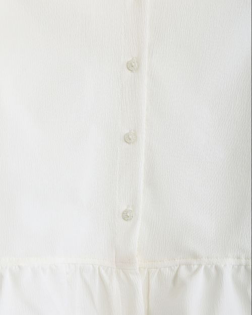 Girls white crinkle-texture button-front shirt with ruffle hem and cuffs 4 yrs Front | Locafy