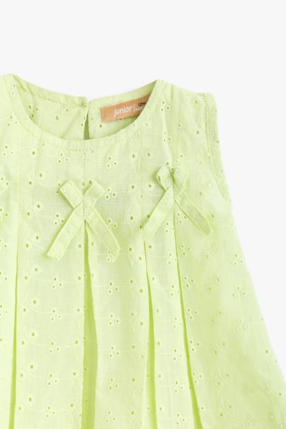Baby girl pleated broderie anglaise top in soft lime green with bow detail 3-6 mth Front | Locafy