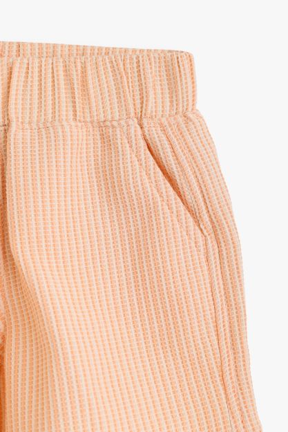 Newborn girls ribbed textured shorts with elastic waistband in soft peach 3-6 mth Front | Locafy